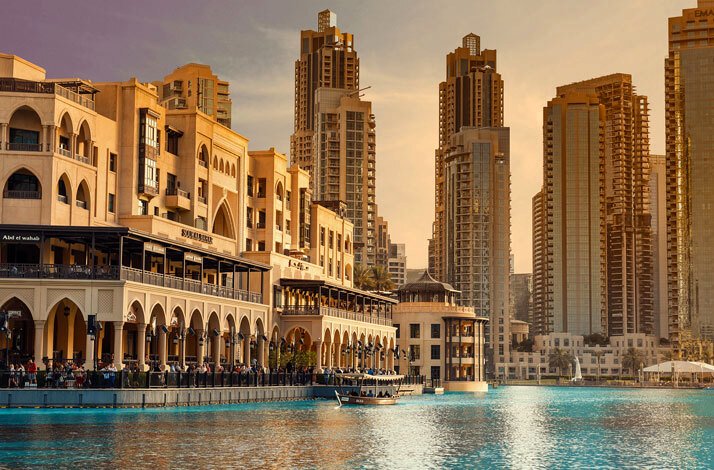 The view on building and a pond in Dubai