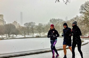 Participants of Fit Tour experience running in the Central Park, New York in winter.