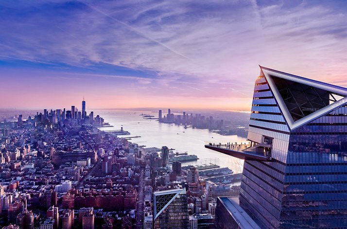 Aerial view of Hudson Yards and New York City at sunset.