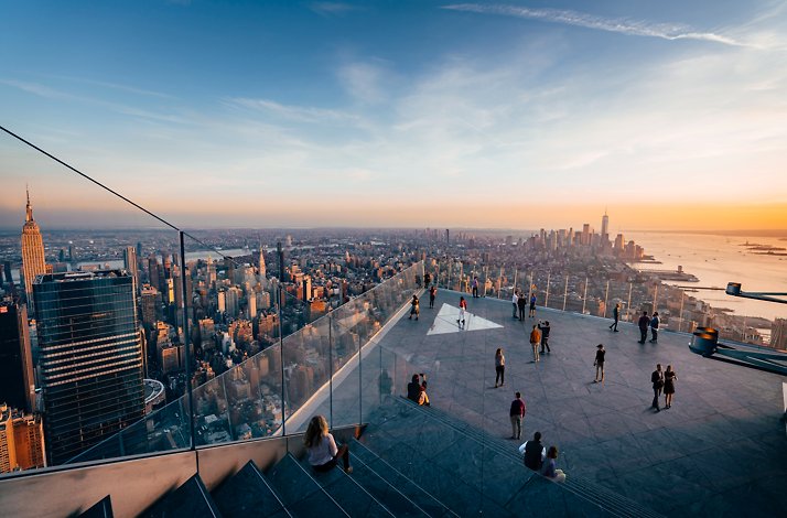 Visitors enjoying the view on the Edge outdoor sky deck in NYC.