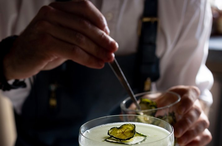 Dine above the clouds with preferred table reservations at Peak with Priceless: In New York, New York Table at Peak on the 101st floor with NYC skyline at sunset.