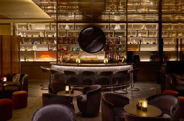 Cozy indoor view of Quin Bar featuring warm lighting and inviting décor.