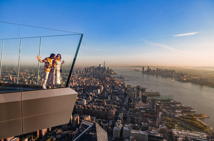 Couple at Edge observation deck, 30 Hudson Yards, New York City.