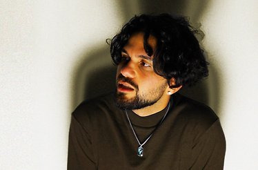 Promotional photo of music artist Aries.