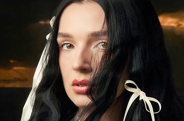 Promotional banner for music artist Poppy.