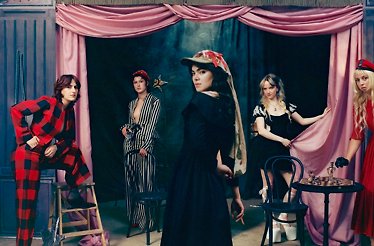 Promotional banner for music band The Last Dinner Party, displaying the band members.