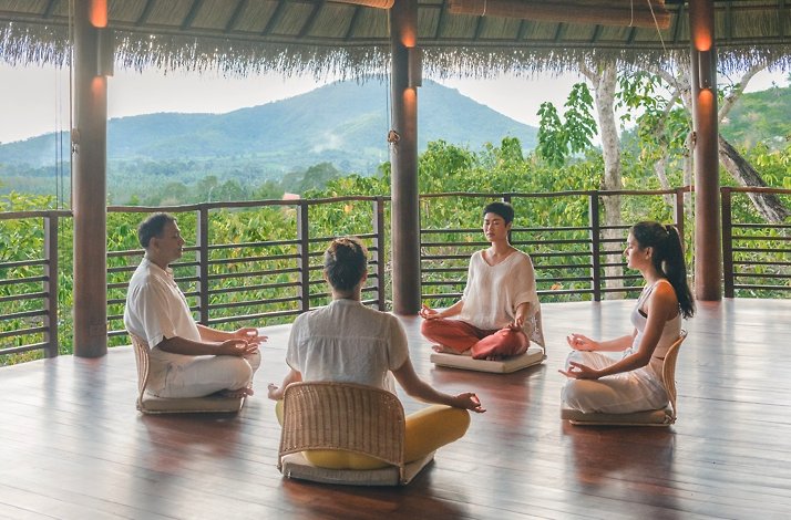 Guests meditating at Kamalaya Koh Samui Wellness Sanctuary & Holistic Spa.