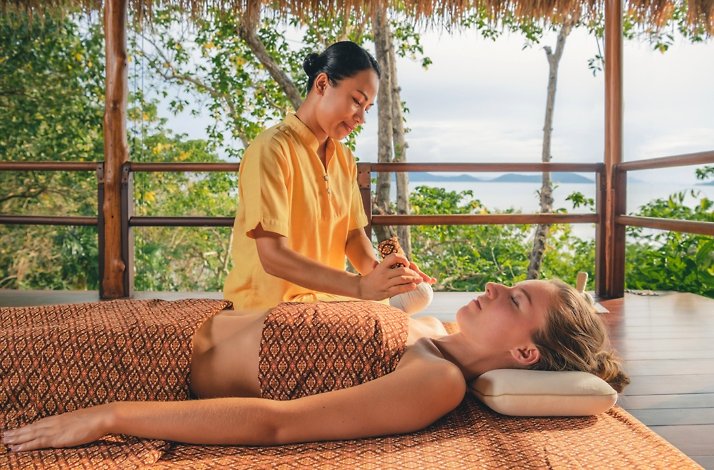 Guest receiving a massage treatment at Kamalaya Koh Samui Wellness Sanctuary & Holistic Spa.