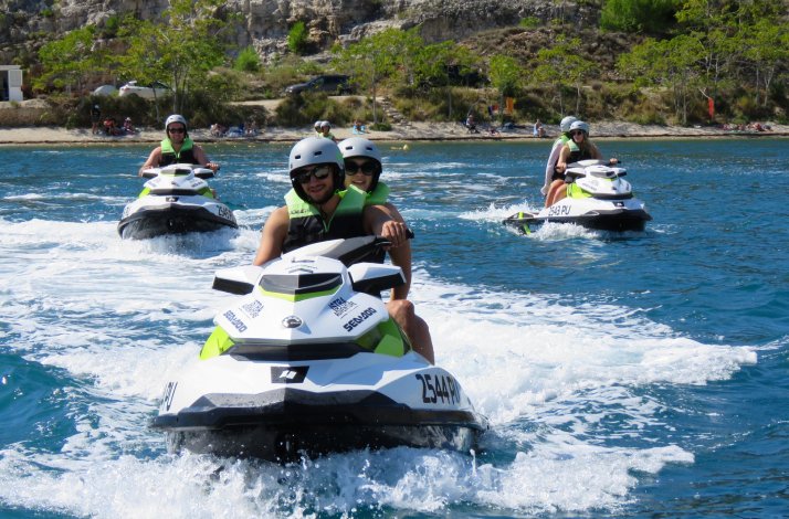 A group of people jet skiing in Istria, Croatia.