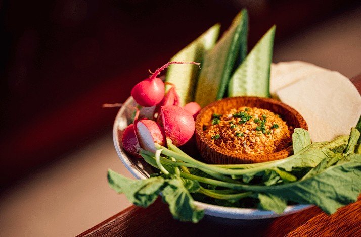 Vegetables plate with garnish from the menu of Communal Table by Gen.