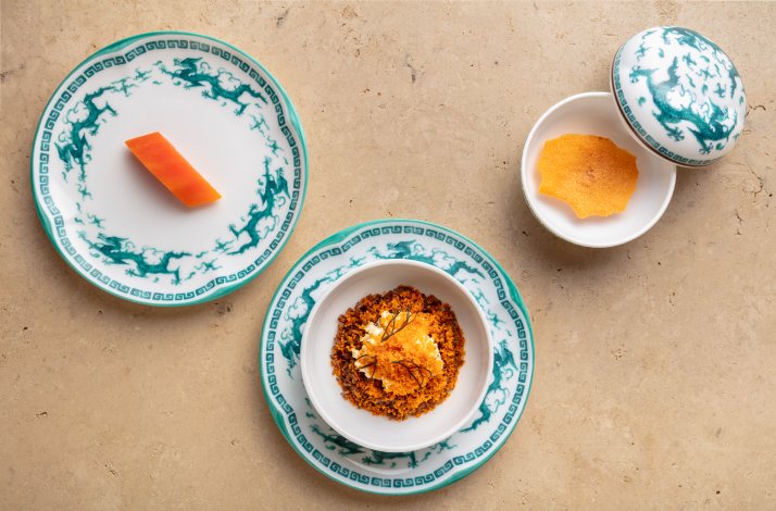 Three decorated plates with dishes of Malay cuisine served in Gēn restaurant in Georgetown