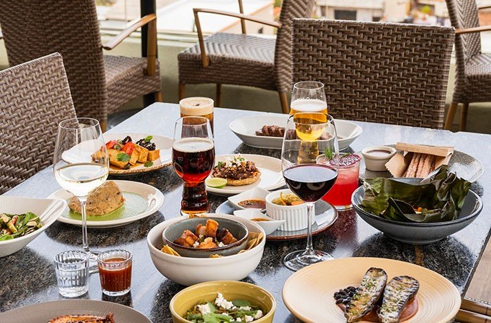 Table for four people from seven course menu in Antonia Rooftop restaurant.