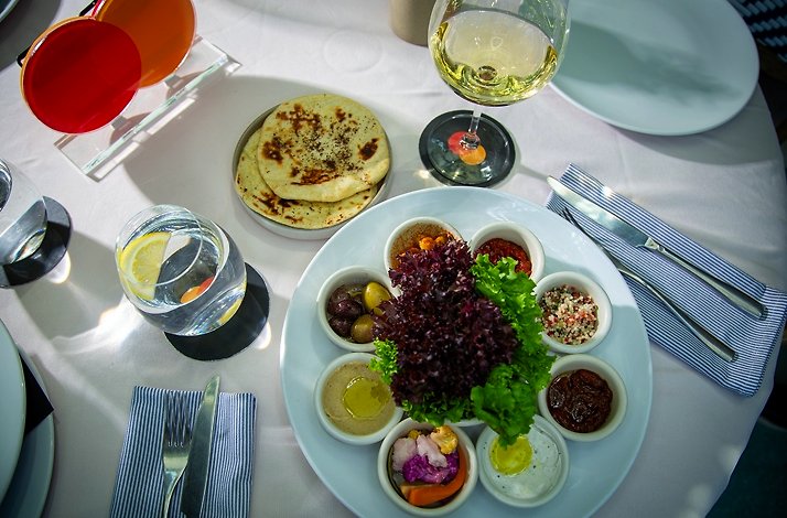 Diverse dishes presented at the Alesia Mediterraneo Restaurant.