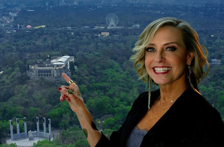 Author and historian Elisa Queijeiro pointing on National Museum of History Chapultepec Castle, Mexico City. 