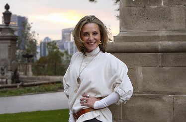 Author and historian Elisa Queijeiro smiling on camera.