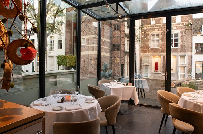 The interior of Rozemarijn restaurant with panoramic windows