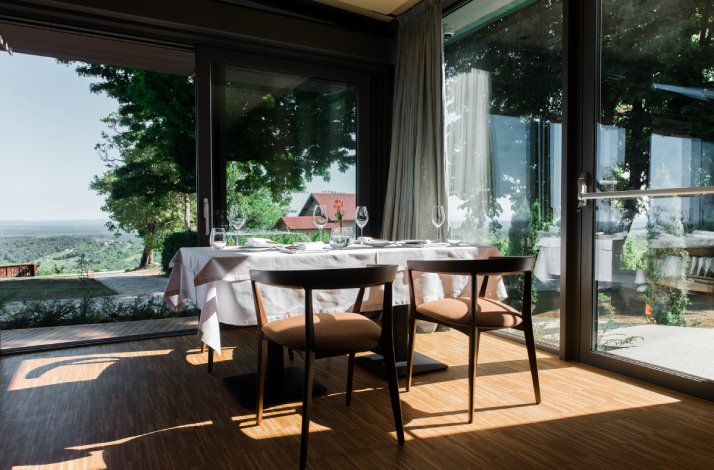 View at the dining area of Bernard Korak’s namesake restaurant with breathtaking views of the Plješivica Mountains.