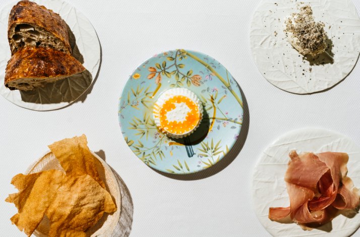 Five dishes beautifully served and displayed on the table.