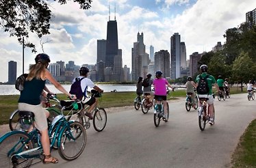 A group of tourists on a bike tour of of Chicago's North Side.