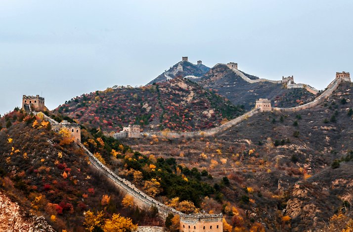 People riding a boat on the Gubei man-made canal during the tour