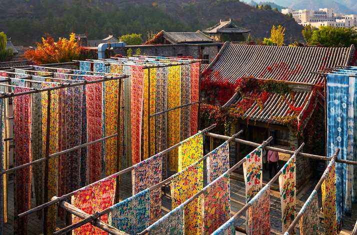 Colourful fabrics created during a traditional craft workshop using Chinese tie-dye technique in Beijing, China.