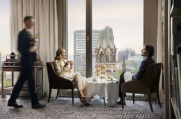 Afternoon tea at Waldorf Astoria Berlin with views of the Kaiser Wilhelm Memorial Church.