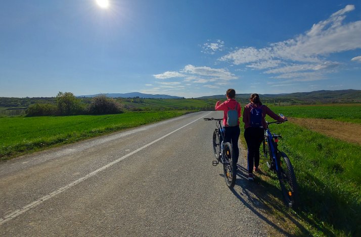 Experience participants riding along the road and enjoying magnificent views