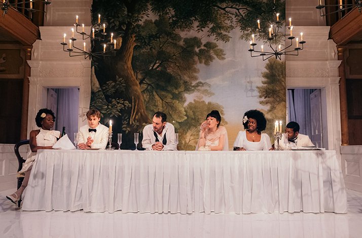 An ensemble of actor performing A Midsummer Night's Dream at Shakespeare's Globe.