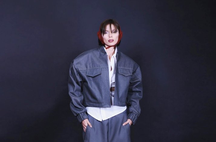 A model showcasing an outfit from the Ocelote fashion house collection.
