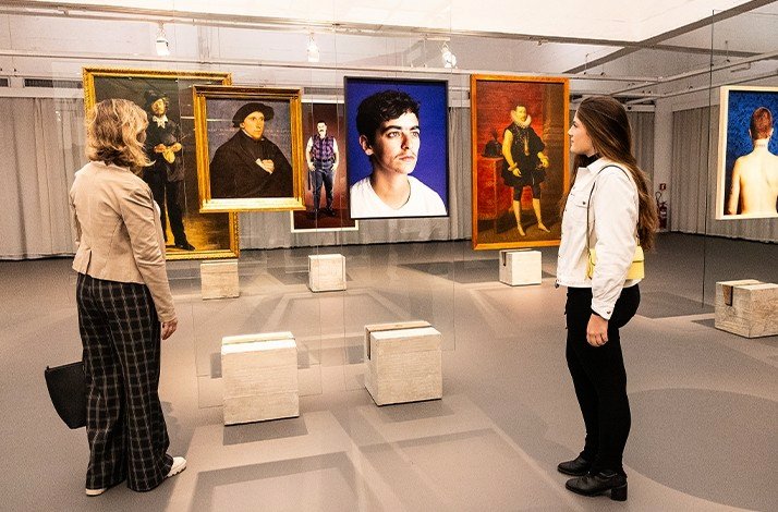 Two women looks at the art pieces in one of São Paulo Museum of Art showrooms during after-hours tour. 
