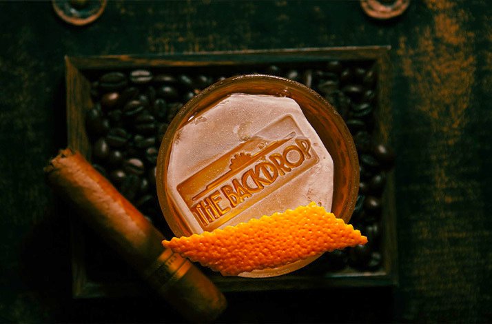 Backdrop logo imprinted on Ice served in the Backdrop cocktail bar in Singapore