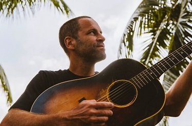 Promotional banner for artist Jack Johnson Surfilmusic Tour