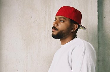 Promotional banner for Bryson Tiller.