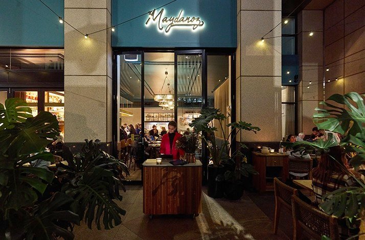 A view of the Maydanoz building with the branded logo at the top of the entrance