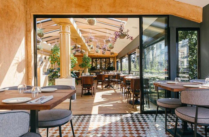 The sunny terrace of  Efendy - an esteemed Istanbul establishment known for its airy vibe, open kitchen, and prestigious Michelin Bib Gourmand and Gault Milieu awards