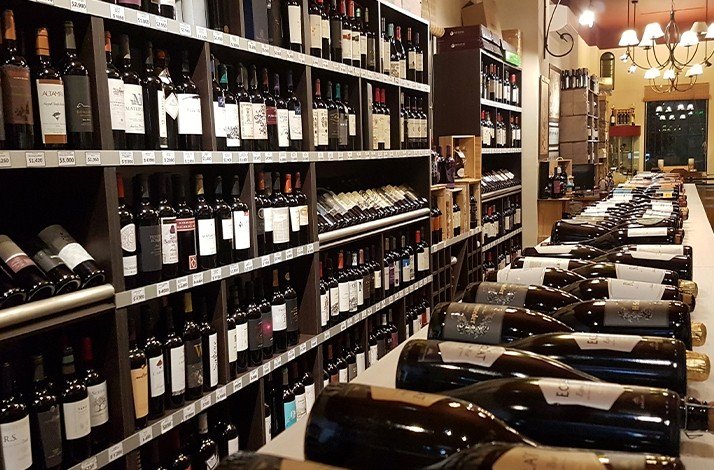 Shelves full of Argentine wines at Tierra Mendocina Wine Bar