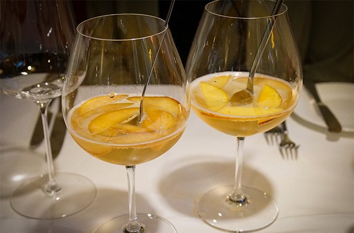 Two glasses full of cocktail.