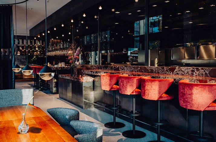 Interior of a Munich restaurant featured in Bianca Murthy's dining experience.