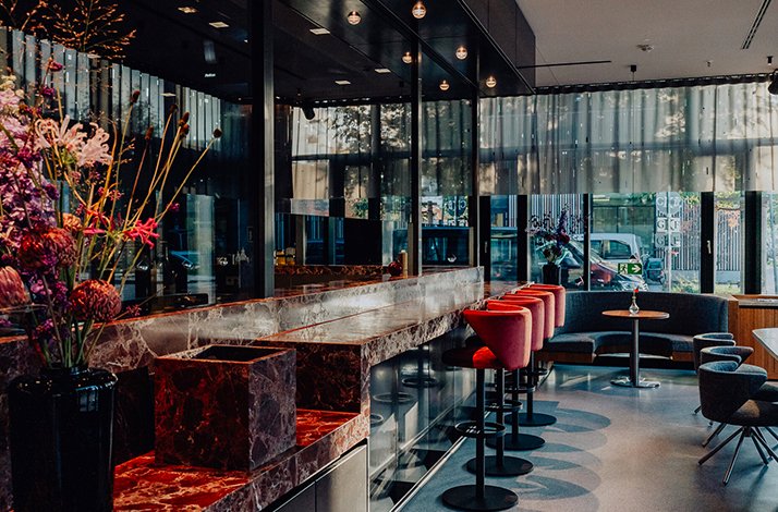 Interior of a Munich restaurant featured in Bianca Murthy's dining experience.