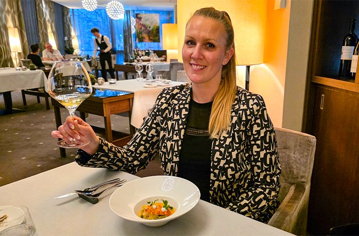 Expert food blogger Bianca Murthy at a Michelin-starred restaurant in Munich.