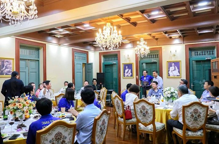 Participants enjoying a meal of traditional Thai royal cuisine