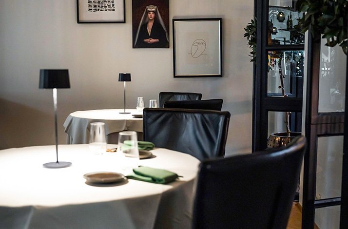 Indoor of Rura restaurant, minimalistic style tables