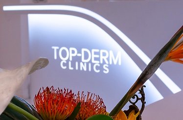 Reception desk at TOP-DERM CLINICS.