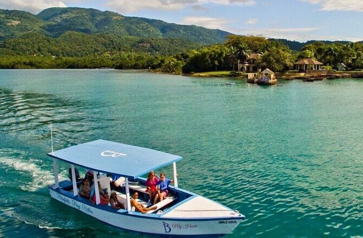 People riding on a glass bottom boat