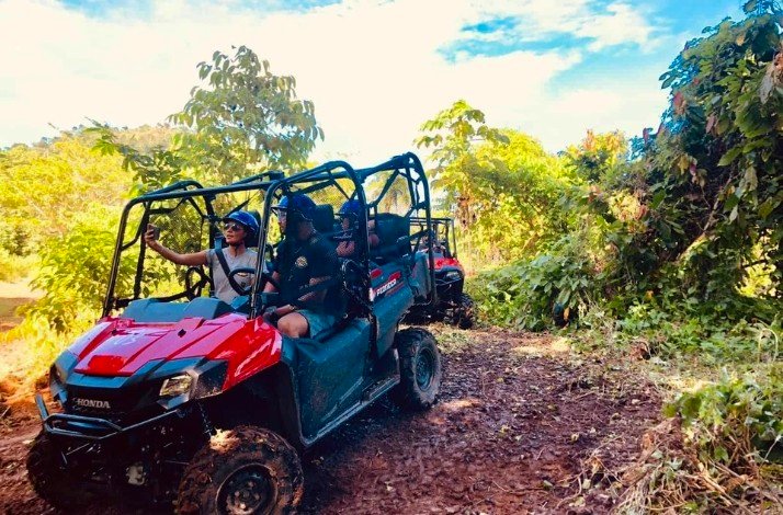 A group of people on a guided off-road buggy tour of Punta Cana 