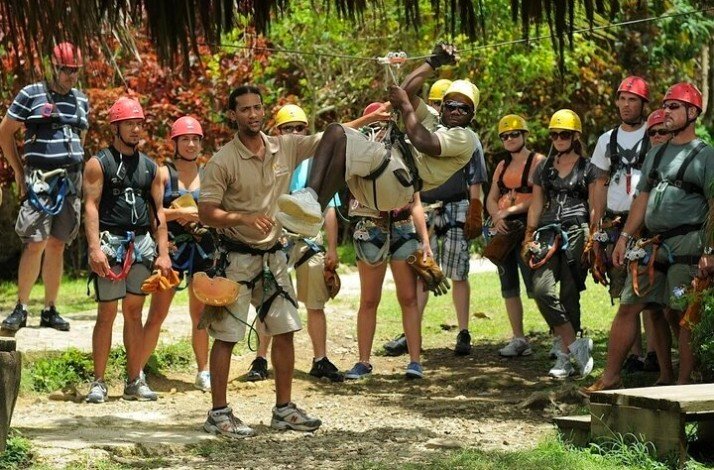 A group of people are waiting in the queue to enjoy riding a zipline at the Anamuya Mountains.