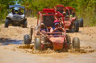 A group of people on a guided off-road buggy tour of Punta Cana 