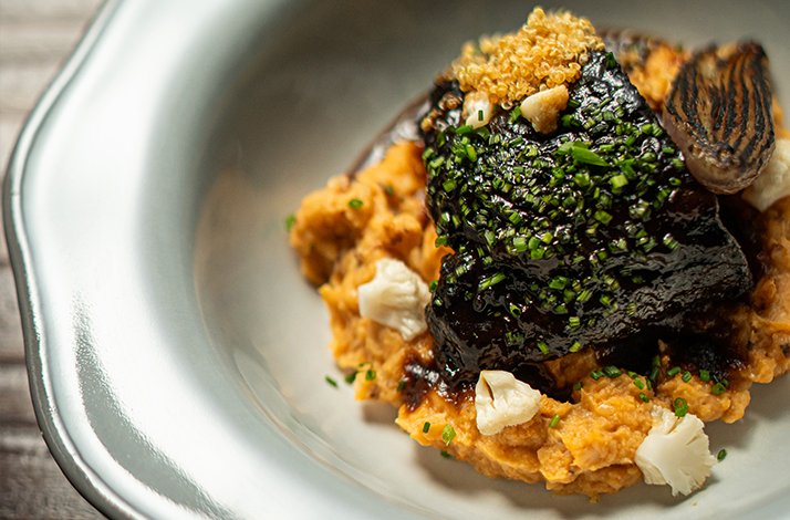 Relish a locally sourced tasting menu that includes an exclusive extra dish: In Dubai, United Arab Emirates A special meal beautifully arranged on a plate and served at Michelin star restaurant BOCA