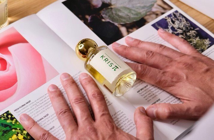 A sample of Crispy perfume in the middle of a magazine