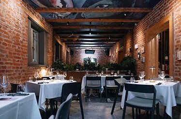 Dining area at the Kupaj Gourmet restaurant in Cluj-Napoca, Romania.